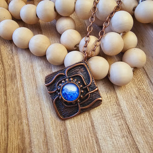 "Strength" pendant