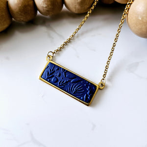 "Determined" pendant