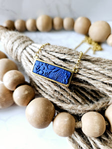 "Determined" pendant
