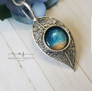 "Shoreline" feather pendant